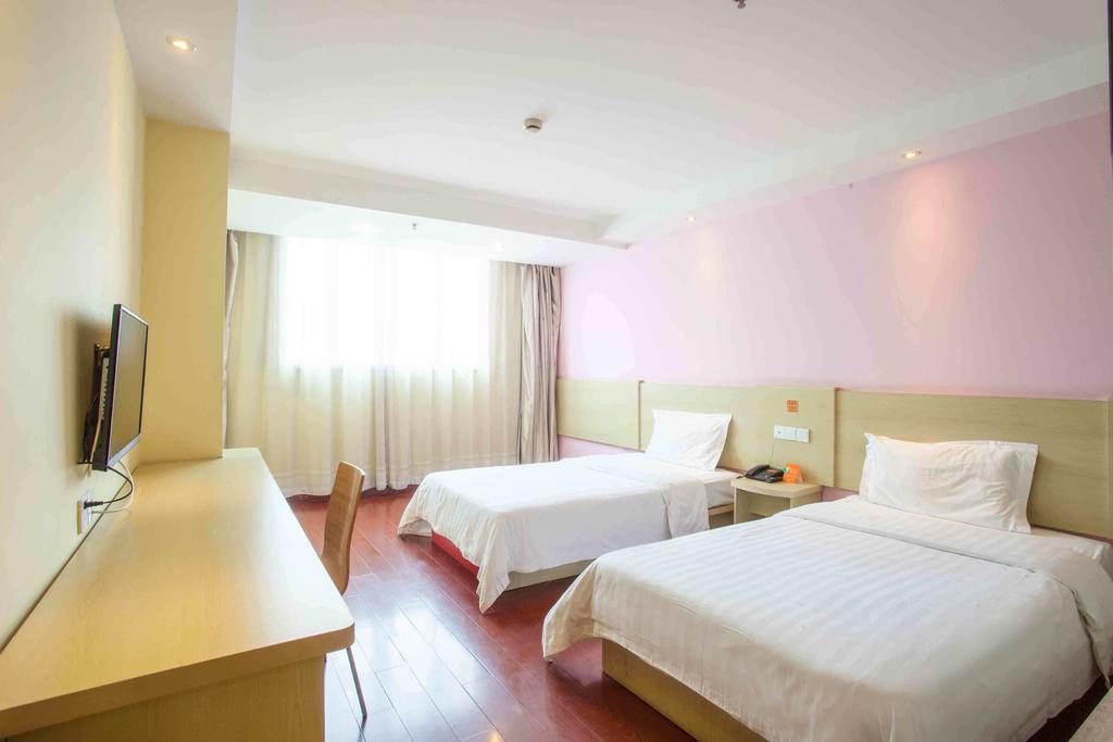7Days Inn Taizhou Nantong Road Zhongjia Номер фото