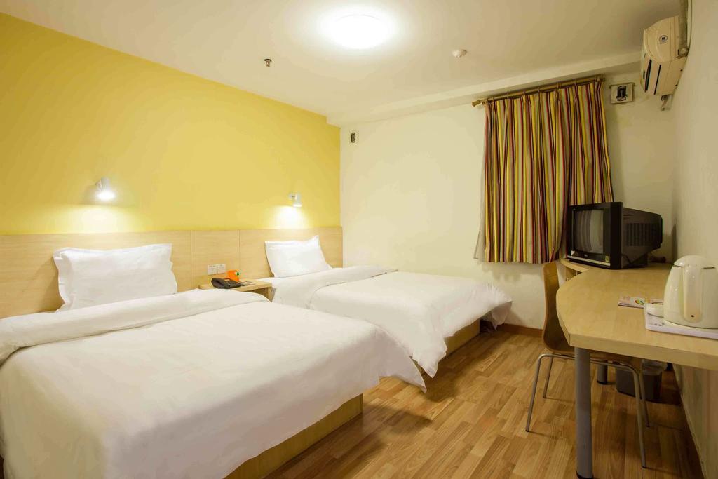 7Days Inn Taizhou Nantong Road Zhongjia Номер фото